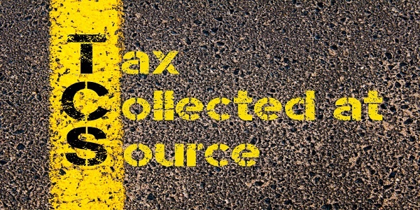 Concept image of Accounting Business Acronym TCS Tax Collected at Source written over road marking yellow paint line.