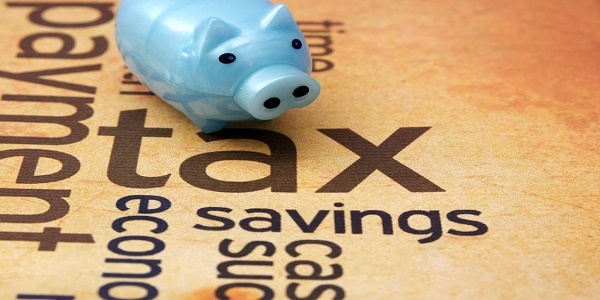 Tax Savings- Piggy bank and tax concept