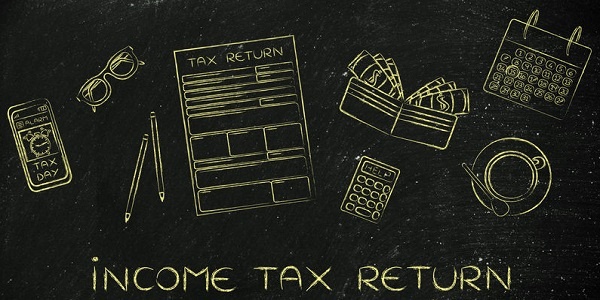 Income Tax Return: tax return forms to fill out, surrounded by office desk objects & smartphone with alert