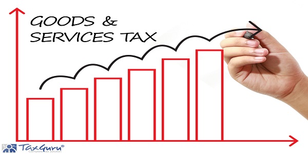 Businessman drawing GOODS & SERVICES TAX Graph on virtual screen