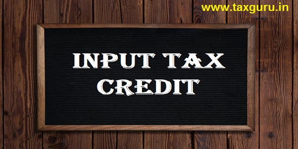 Input tax Credit - Blank blackboard on wood background