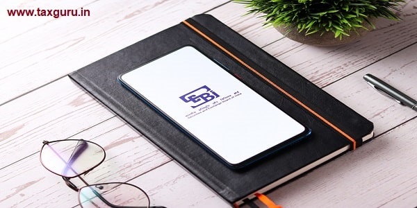 SEBI logo on phone screen stock image