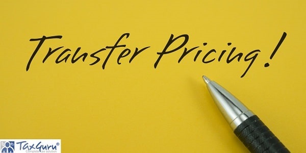 Transfer Pricing! note with pen on yellow background
