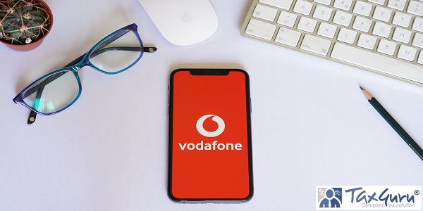 Vodafone Iphone Screen with Magic Mouse and Keyboard